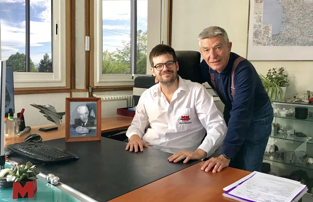 Deux générations de la famille Monin dans les bureaux